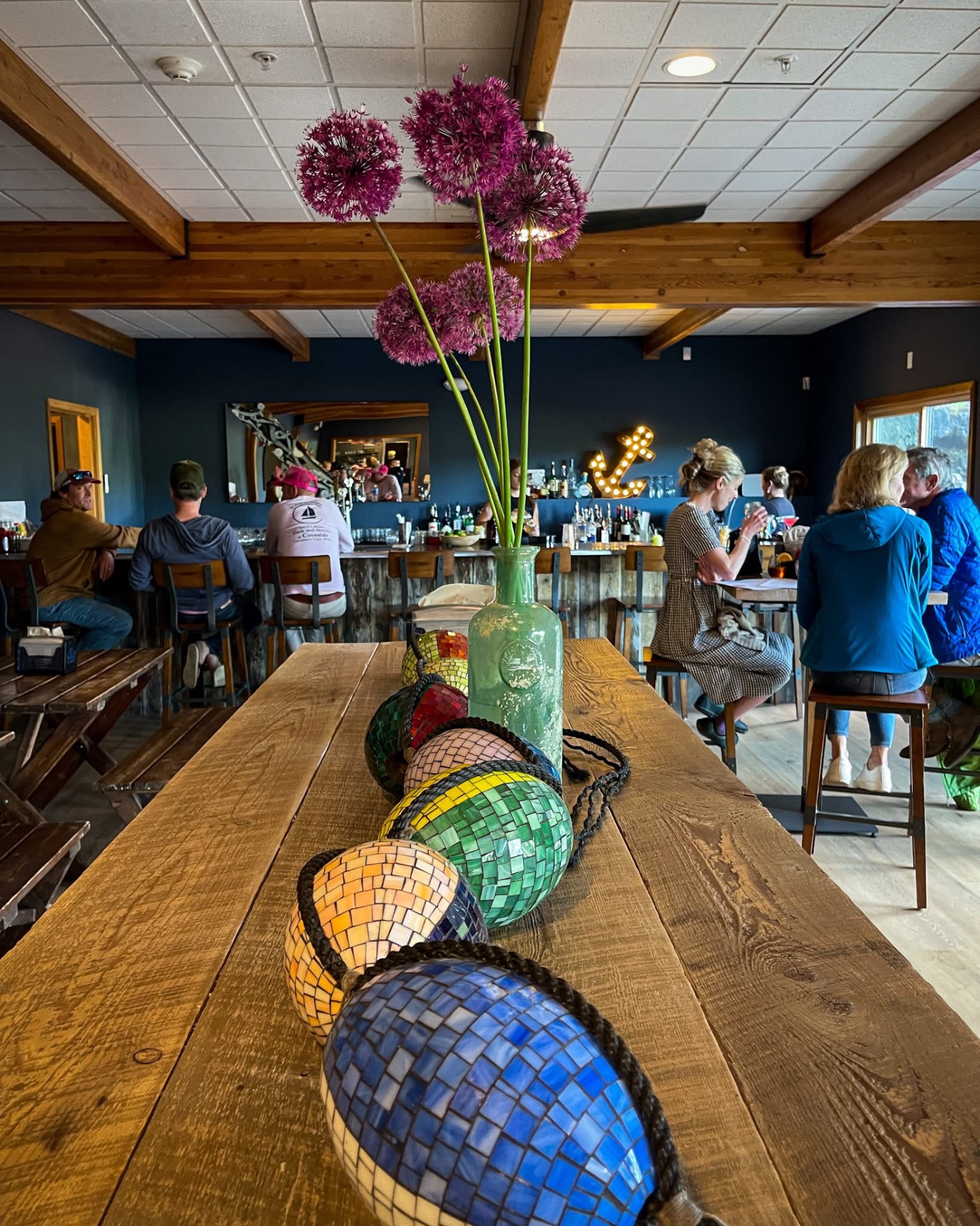The Contented Sole bar with mosaic buoys and an anchor sign